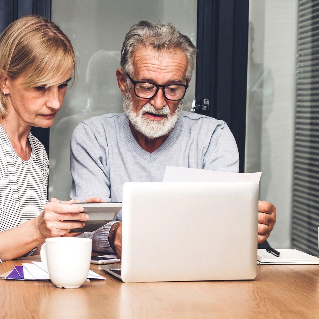 couple concerned laptop